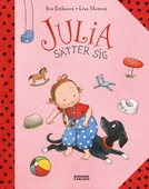 Julia sätter sig