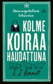 Kolme koiraa haudattuna