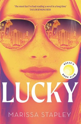 Lucky - A Reese Witherspoon Book Club Pick about a con-woman on the run (ebok) av Marissa Stapley