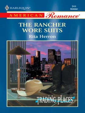 The Rancher Wore Suits (ebok) av Rita Herron